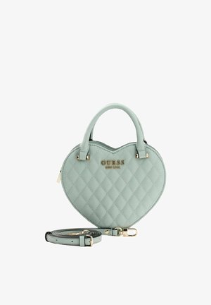 Sac à main en forme de cœur en similicuir matelassé vert menthe clair, avec des accents de quincaillerie dorée et une bandoulière amovible.