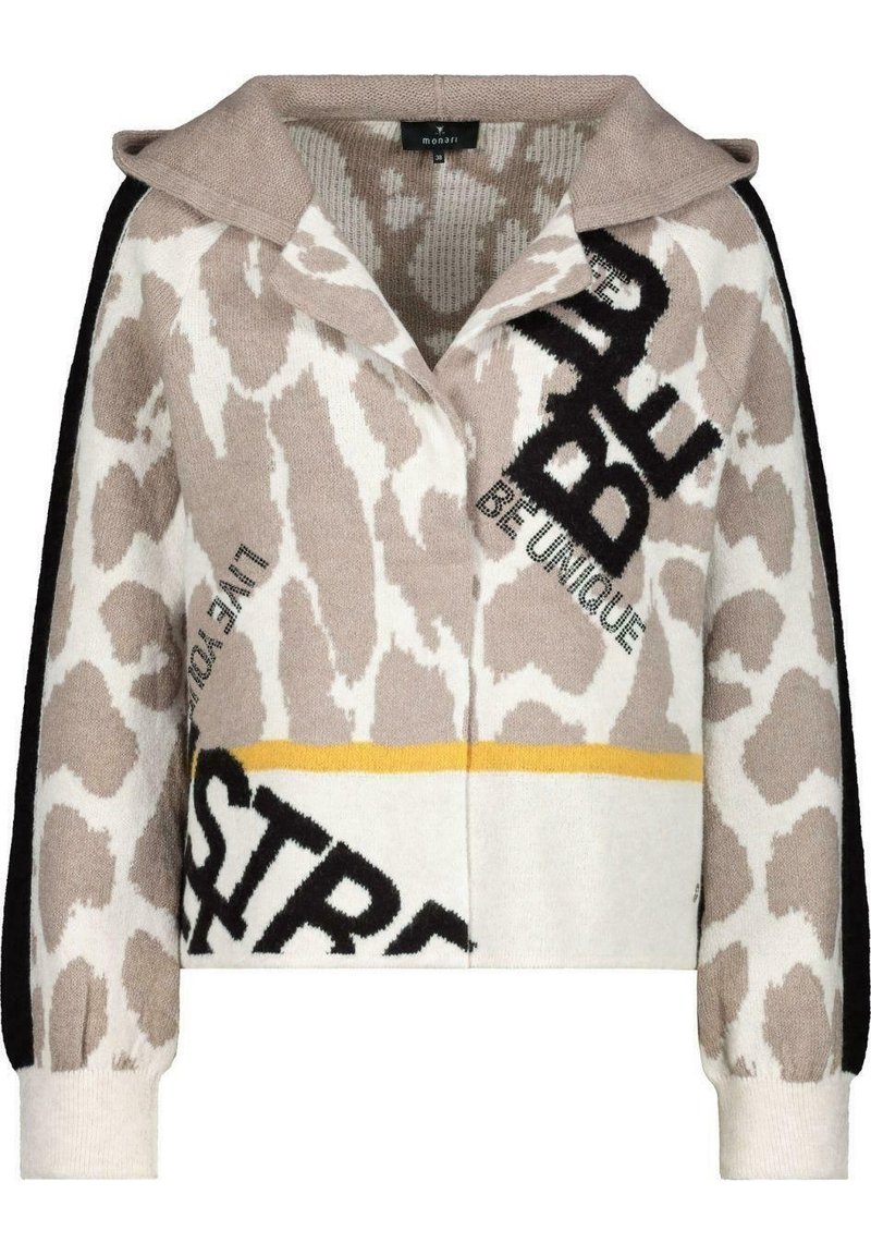 Pull en tricot avec un imprimé animal beige et blanc, présentant des accents noirs, un col et des graphiques textuels dans des couleurs contrastées.