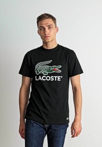 Lacoste Nyomott mintás póló - noir