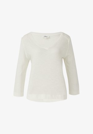 Kohandatud varrukatega, V-kaelusega ülemine osa heleses toonis, valmistatud kergest kangast. Omab vabalt langevat lõiget ja õmmeldud servi lisatud vastupidavuseks.