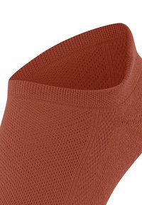Kupferfarbene Socke, atmungsaktives Strickmaterial, nahtloses Design, kurze Länge, gerippter Bund und glatte Textur. Geeignet für den Freizeitgebrauch.