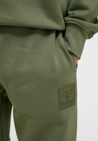 Hummel CLEAN ADJUSTABLE - Trainingsbroek - olivine