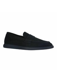 Schwarze Wildleder-Pantoletten mit einem gepolsterten Vorderband, abgerundetem Zeh und einer niedrigen schwarzen Gummisohle. Minimale Nahtführung und glatte Textur.