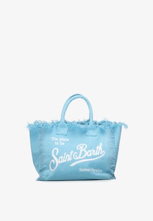 Borsa tote in tessuto blu con bordi sfrangiati, due manici e scritta bianca sul davanti "The place to be Saint Barth Summer Paradise".