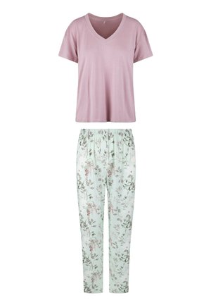 T-shirt V en rose clair associé à un pantalon élastique à imprimé floral en vert pâle, avec des accents roses et gris et une coupe décontractée.