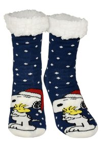 Calzini blu navy con motivo a pois bianchi e bordo soffice bianco, raffiguranti Snoopy e Woodstock con cappelli invernali su uno sfondo innevato.