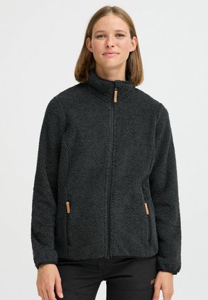 Black fleece jacket with high collar, zippered front, and two side pockets featuring wooden pull tabs. Soft, textured fabric.
