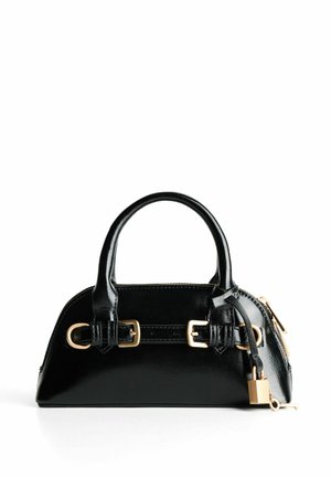 Black patent leather handbag with gold hardware, short handles, zip closure, and decorative accents including a lock and key detail.