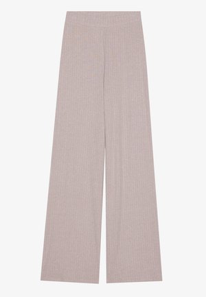 Pantaloni a gamba larga in beige chiaro, con texture a coste, vita elastica, forma fluida. Il tessuto appare morbido e traspirante. Nessun hardware o dettaglio visibile.