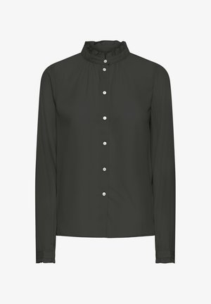 Blusa lunga a maniche corte di un verde scuro, con colletto alto arricciato, chiusura frontale con bottoni e polsini elasticizzati. Tessuto liscio con un leggero lucido.