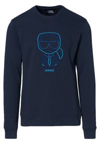 Mörkblå långärmad sweatshirt med broderad tecknad figur som bär solglasögon, slips och hästsvans på bröstet.