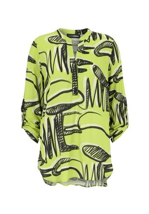 Lime green blouse with abstract black and white patterns, featuring a V-neck, three-quarter sleeves, and a relaxed fit design.
