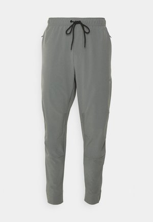 Nike Performance UNLIMITED  - Träningsbyxor - smoke grey/black/reflective silver