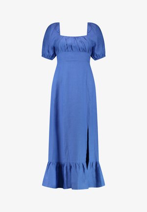 Robe en lin bleu avec des manches courtes bouffantes, décolleté carré et fente haute sur la cuisse. Elle présente un buste froncé et un ourlet à volants évasés.