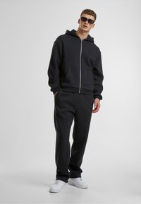 Urban Classics Tracksuit bottoms - black