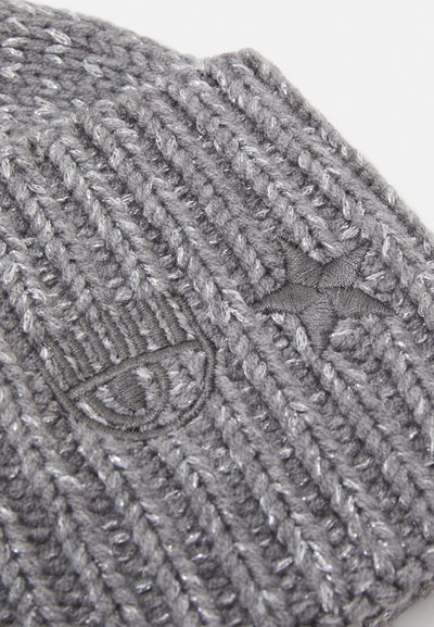 Gray knitted beanie with ribbed texture, featuring a subtle shiny thread. Notable accents include an embroidered logo and detail design.