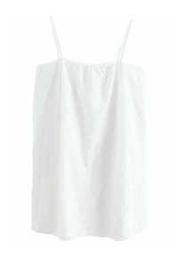 Camisole blanche avec de fines bretelles réglables, dotée d'un motif floral texturé et d'une coupe ample et décontractée. Tissu doux, finition lisse.