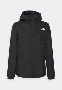 Veste noire imperméable avec capuche, fermeture éclair frontale, poignets élastiques, poches latérales et logo The North Face sur la poitrine.