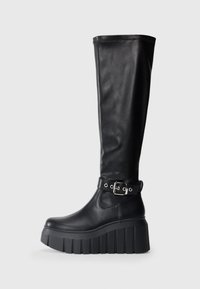 Black knee-high boots made of smooth leather, featuring a thick platform sole, a chunky heel, and an adjustable belt accent near the ankle.