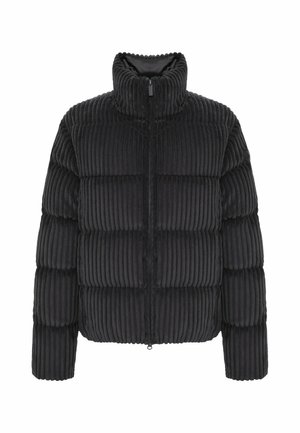 Veste matelassée noire en velours côtelé, avec un col montant, des manches longues et une fermeture éclair sur le devant, sur fond blanc.