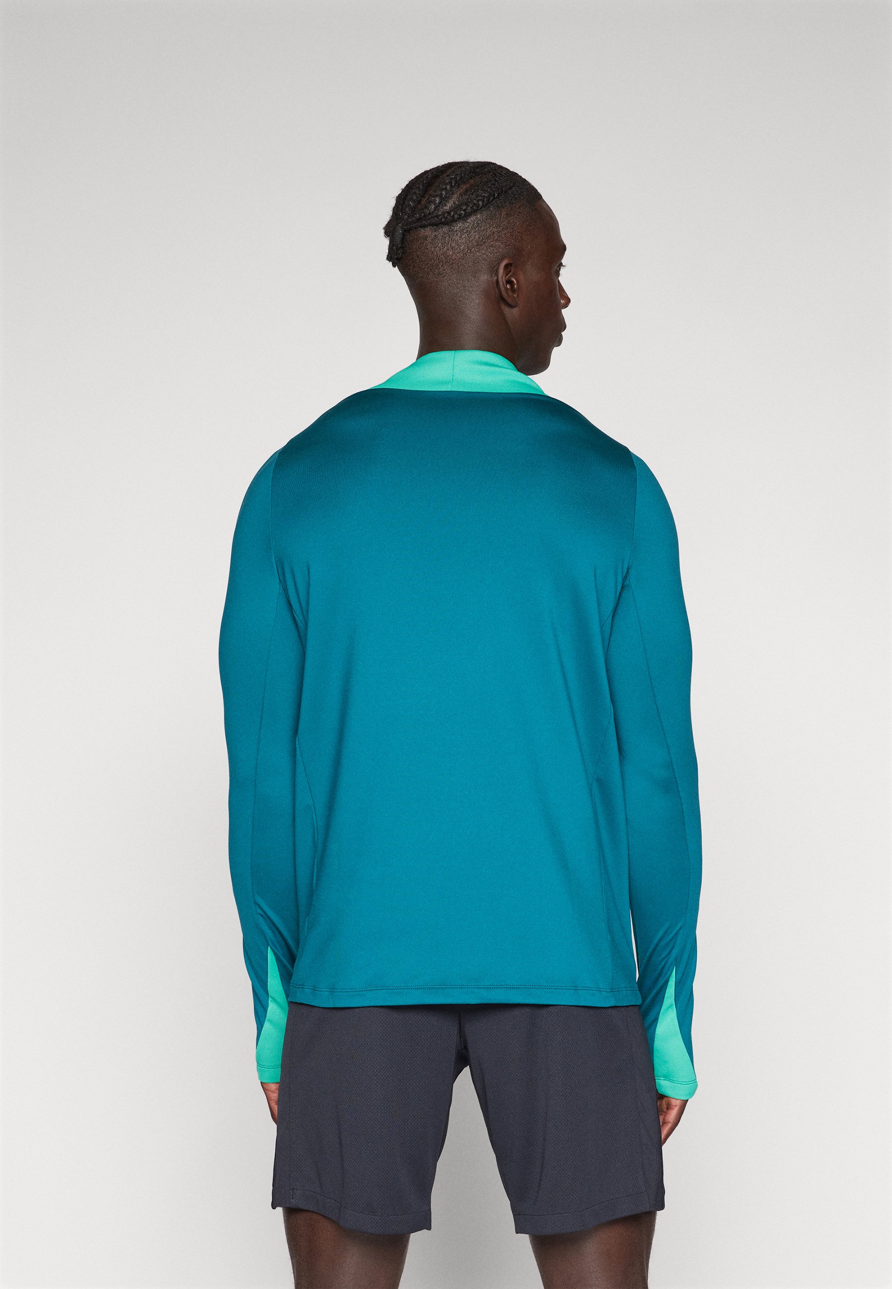 kinetic green nike shirt