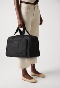 Tommy Hilfiger REPREVE DUFFLE UNISEX - Nädalavahetuse reisikotid - black