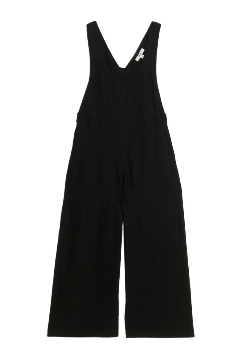 Schwarzer Latzanzug aus weichem Stoff, mit weiten Beinen, tiefem V-Ausschnitt und verstellbaren Trägern. Keine auffälligen Muster oder Hardware.