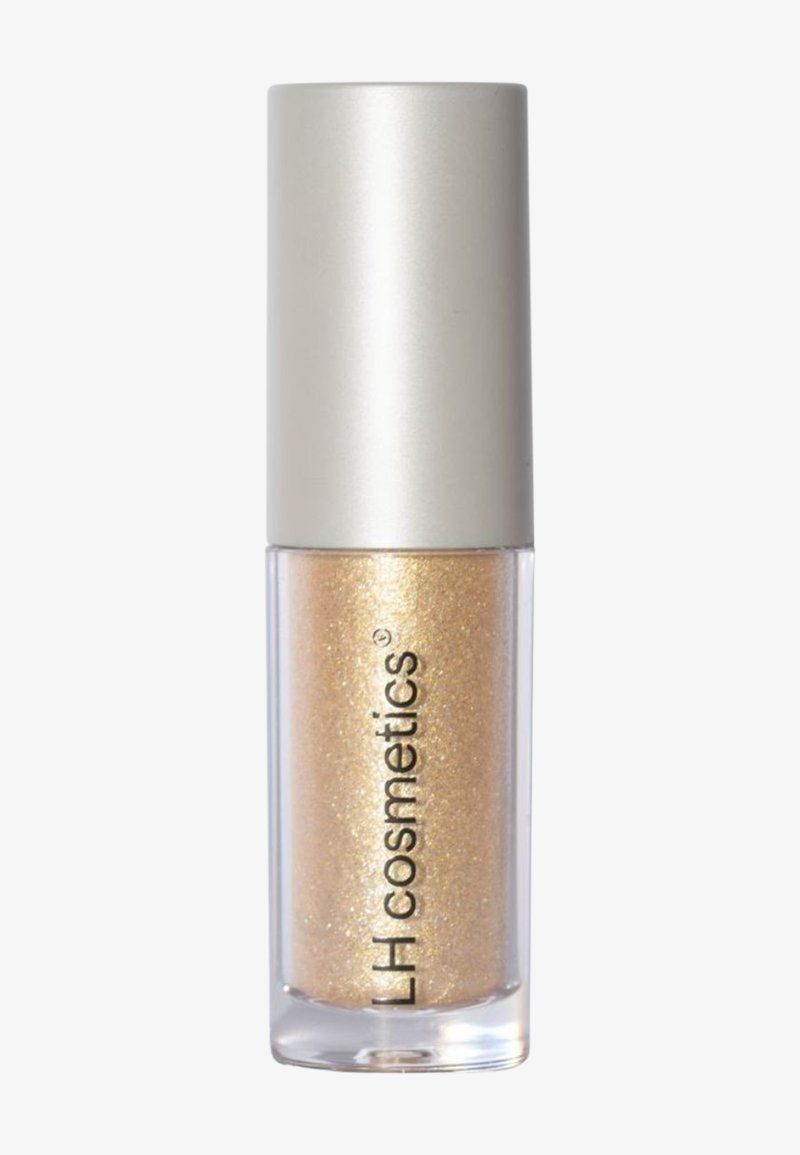 Flacon cylindrique transparent avec un bouchon argenté contenant un liquide cosmétique doré pailleté étiqueté LH cosmetics.