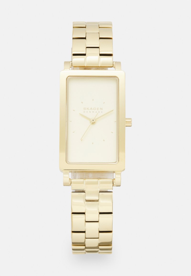 Orologio rettangolare color oro con lunetta liscia, quadrante crema, lancette sottili e bracciale metallico a maglie. Design minimalista con indicatori numerici.