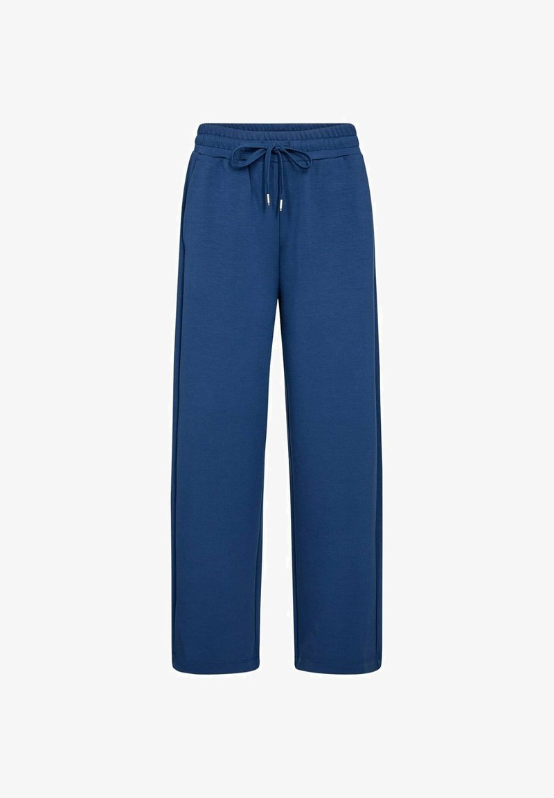 Blauwe wijde sweatpants met elastische tailleband en trekkoord, gemaakt van zacht materiaal, weergegeven tegen een witte achtergrond.