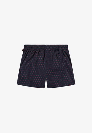Marineblauwe boxershorts met rood hartjespatroon, elastische tailleband en een enkele achterzak op een effen witte achtergrond.