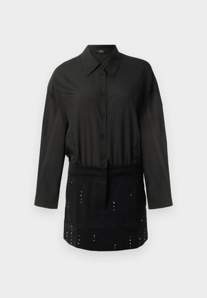 Black long-sleeve button-up shirt with pointed collar and a studded design on the lower front panel.