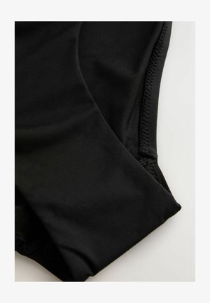 Černé spodní díly plavek z hladkého a pružného materiálu. Mají vysoký pas a ploché švy, s čistým, minimalistickým designem.