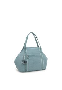 Light blue bag with zip closure, two handles, and white stripes. Features a small pom-pom charm and a front zipper pocket for storage.