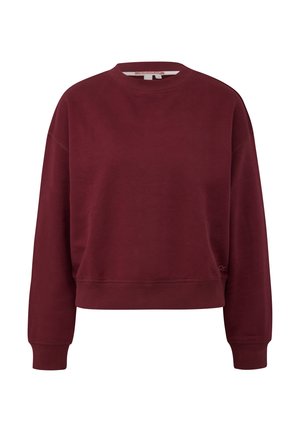 Burgundia värvi dressipluus, mis on valmistatud pehmest kangast; omab ümmargust kaelust, madalat õlalõiget ja ribaga mansette, millel on logo aktsent alla ääres.
