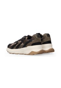 Chunky sneakers featuring a combination of black leather and olive suede, with a textured mesh upper and a white rubber sole with tan accents.