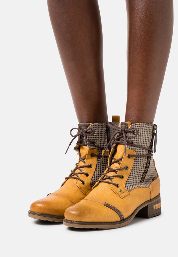 Lace-up ankle boots - gelb