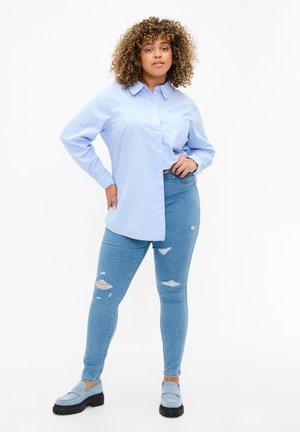 MIT RISSEN - Jeggings - light blue