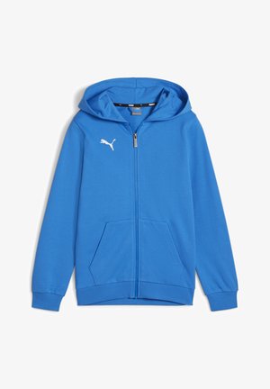 Giacca con cappuccio blu con zip, realizzata in tessuto liscio, dotata di tasca a marsupio e logo Puma bianco sul petto. Polsini e orlo a costine.