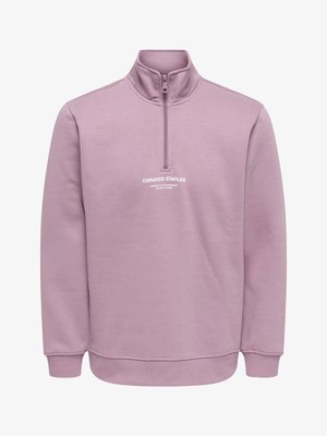 Helelilla neljandiku tõmblukuga dressipluus soonikkoe krae ja mansettidega. Rinnal on väike trükitud logo. Pehme kangatundega.