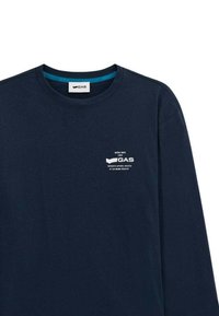 T-shirt a maniche lunghe navy in cotone, con scollatura rotonda e un piccolo logo bianco sul petto con dettagli testuali.