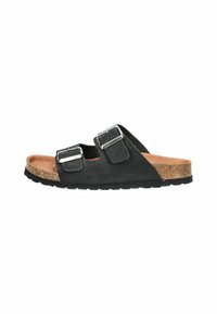 Sandali in suede neri con due fibbie regolabili, soletta in sughero e suola in gomma testurizzata, caratterizzati da un design minimalista e stile open-toe.