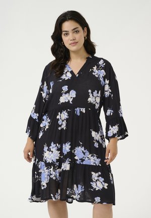 Black floral dress featuring blue and white rose patterns, V-neckline, and flared sleeves, made from a lightweight, textured fabric.