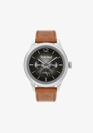 Timberland ur med et rustfrit stålhus, mørkegrå urskive, brun læderrem og et særpræget logo ved kl. 6. Har dag- og datoviser.