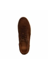 Brown suede sneaker with a rounded toe, textured upper, brown laces, and white rubber outsole; features subtle branding on the side.