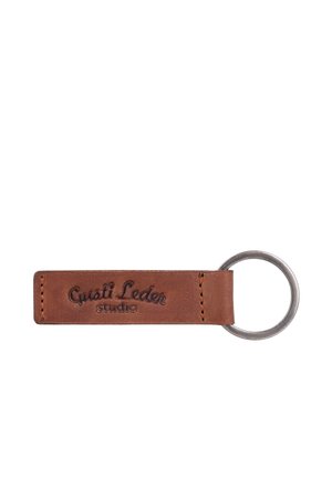 Brown leather keychain tag with stitched edges and a metal ring, embossed with the text "Gusti Leder studio."
