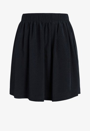 Jupe noire jusqu'au genou avec taille élastique et texture subtilement pointillée, tissu froncé pour une silhouette légèrement évasée.