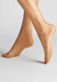 Beige synthetische Strumpfhosen mit einer glatten, transparenten Textur, die das Bein umschmeichelt. Verfügt über eine verstärkte Zehenpartie und ein nahtloses Design, das den Komfort erhöht.