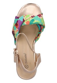 Färgglad sandal med blommönster och en snodd tygrem. Har en glänsande guld-färgad sula och en smal ankelrem.