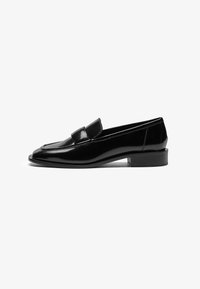 Black patent leather loafers with a square toe, featuring a raised strap across the front and a low, block heel. Smooth texture throughout.